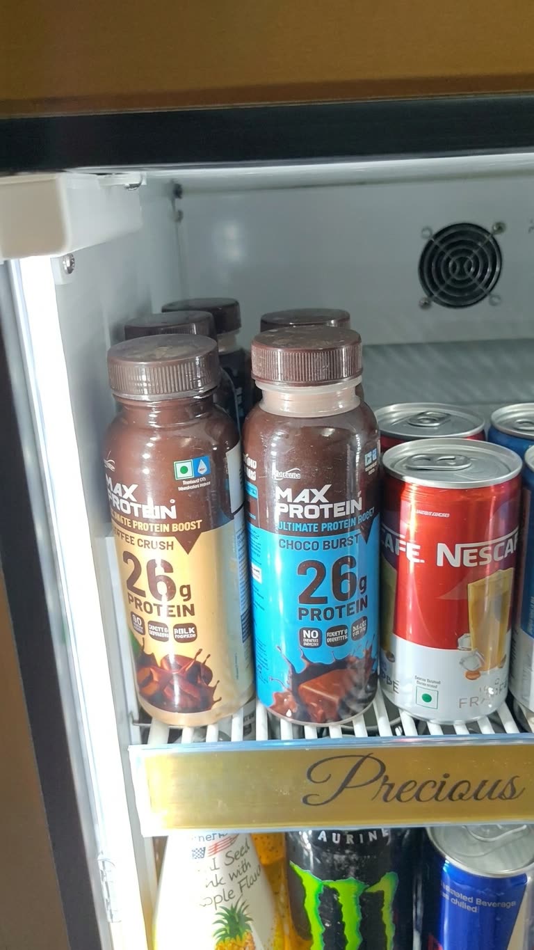 Chilled protein shakes in a display fridge at IRL Space, Theni